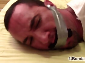 Victor SockGagged and TapeGagged tight and captured with socks inside his mouth wrapped the tape around his head PREVIEW